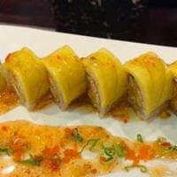 Mango Fancy Roll · Spicy crab stick, shrimp tempura topped with mango & mango sauce with crispy onion.