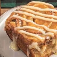 Giant Cinnamon Roll · Giant cinnamon roll with a cream cheese icing. Room temperature or warmed.