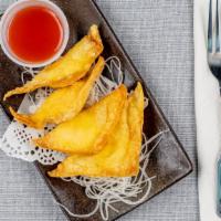 Crab Rangoons · mixture cream cheese and crab, wrapped with wonton skin. deep fried, served with sweet sour ...