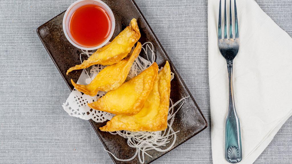 Crab Rangoons · mixture cream cheese and crab, wrapped with wonton skin. deep fried, served with sweet sour sauce