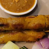 Satay Chicken · Chef special chicken skewers marinated with lemongrass and served in homemade peanut sauce.