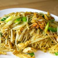 Singapore Noodles · Stir fried rice vermicelli seasoned with curry powder, bean sprouts, pak choi and soy sauce ...