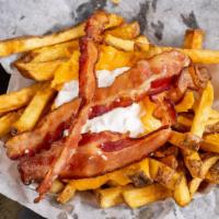Loaded Fries · Cheddar, sour cream and bacon.