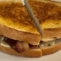 Super Patty Melt · Hamburger patty, bacon, onion, swiss cheese on grilled rye.