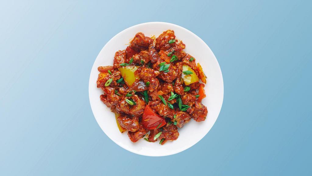 Chili Chicken Ching'S · Tender chunks of chicken marinated with ginger, garlic, chilies, batter fried and wok tossed with Indo Chinese sauces, garlic, chilies, and peppers
