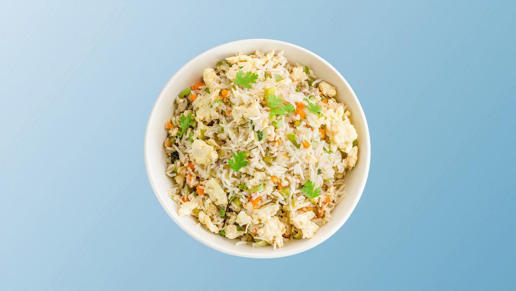 Fried Rice Egg-Tastic · Long grain aromatic rice wok tossed  with fried egg, mixed vegetables and Indo-Chinese sauces