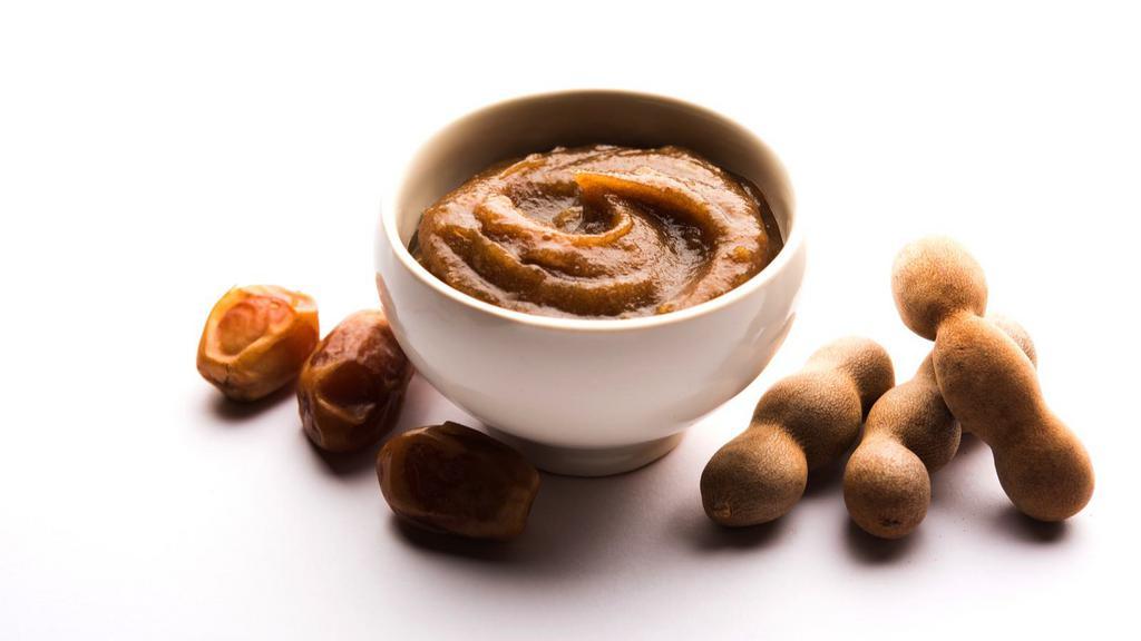Tamarind Chutney · A tangy chutney made with sweet and sour tamarind.