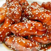 Sesame Chicken 芝麻鸡 · Spicy. Deep fried chicken with a special sauce and sesame seeds on top.