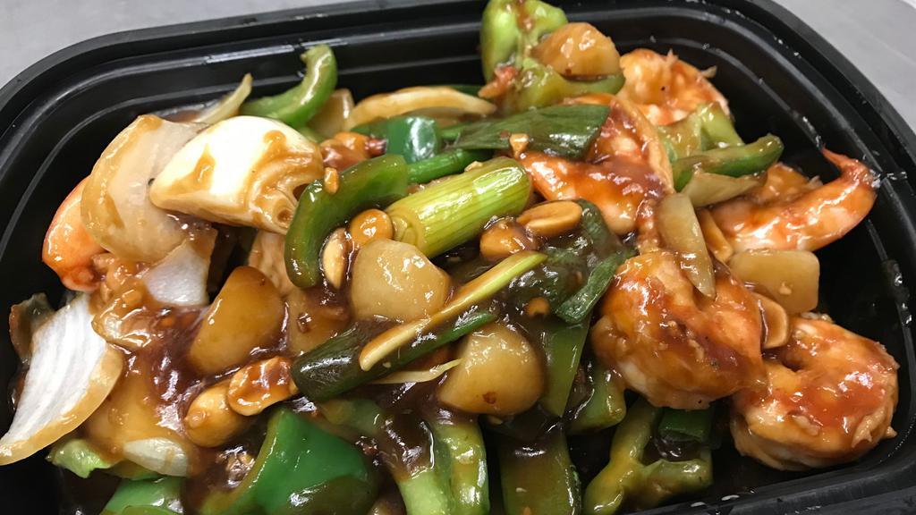 Kung Pao Shrimp · Hot & spicy. Shrimp sauteed in rich brown sauce w. Red peppers & peanuts.