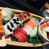 Manhattan Bridge · Twelve pieces of sushi, eighteen pieces of sashimi with three special rolls. (Raw fish )