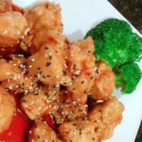 Sesame Chicken · Crispy chicken breast wok-tossed in sweet brown sauce and sesame seeds.