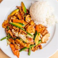 Happy Family · Stir-fried crab meat, shrimp, beef, chicken, and scallop with mixed vegetables cooked with b...