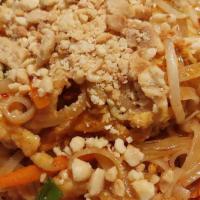 Pad Thai Noodles · Rice noodle sautéed with scrambled egg, scallion, bean sprout,  onion and carrots in Thai sw...