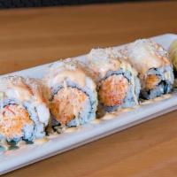 Crunch Munch Roll · White shrimp and crunch flub on top of yum yum with spicy mayo sauce.