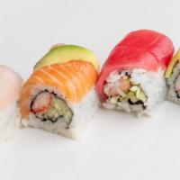 Rainbow Roll · Crab stick and cucumber inside, topped with tuna, salmon, white tuna, and avocado.(Raw fish)