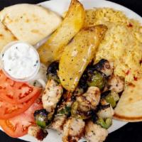 Chicken Kabob Platter · 2 skewers. Served with pita bread  or garlic bread. Choice of soup, salad, coleslaw and 2 si...