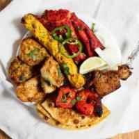 Zaika Mix Grill · Choice of Chicken Seekh Cheese Kabab, Tandoori Chicken, Chicken Chapli Kabab, Lamb Chop, Fis...