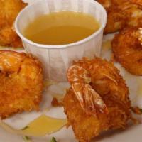 Coconut Shrimp · Hand breaded and served with pineapple rum sauce.  Just might be the best Coconut Shrimp you...