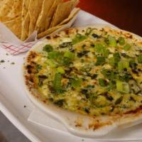 Spinach & Artichoke Dip · With tortilla chips.