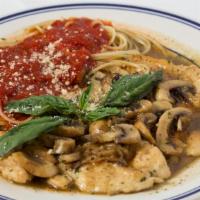 Chicken Marsala · Marsala wine cooked with fresh chicken and spaghetti noodles with Demi-Glaze.