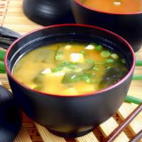 Miso (L) · Scallion, Tofu, seaweed with a soybean base hot soup.