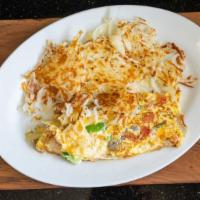 Veggie Omelette · Green peppers, onions, tomato, mushrooms and cheese.