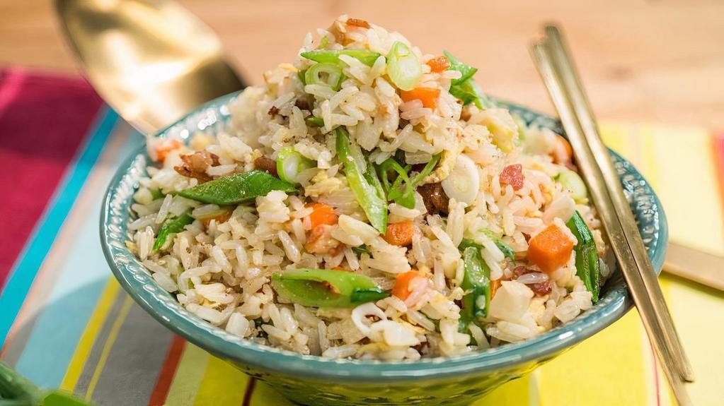 Fried Rice  · This is the classic house fried rice that have taken us years to mastered. Includes 2 egg rolls and sweet & sour sauce.

Ingredient: Chicken or Veggie, rice, carrots, chinese broccoli, chinese cabbage, and special house sauce.
Spice level: 0/5