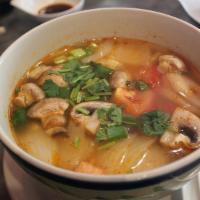 Tom Yum · Choice of meat, mushroom, onion and tomato in special sour, spicy and clear broth. Topped wi...