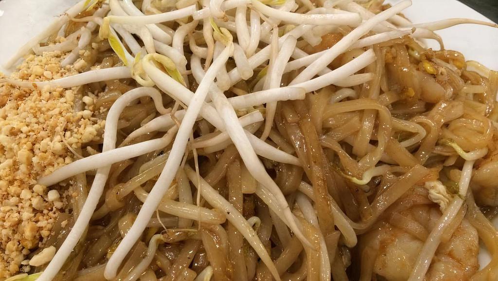 Pad Thai · Blank
  


Stir fried with meat of your choice, Rice noodle with eggs, bean sprout, green onion. Topped with peanuts, bean sprouts & lime.