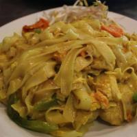 South Curry Noodle · Stir fried with meat of your choice, fresh wide rice noodle with eggs, carrot, white onion &...