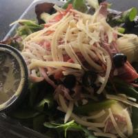 Antipasto Salad · Mixed greens, ham, pepperoni, hard salami, olives, tomatoes, green peppers, artichokes, Parm...