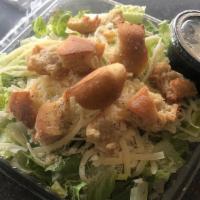 Caesar Salad · Fresh romaine, croutons, Parmesan cheese, and our Caesar dressing.
