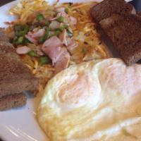 Holy Moly Breakfast · Hash browns topped with onions, green peppers, and diced ham, served with two eggs and toast.