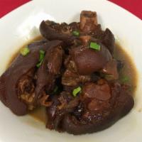 Braised Pig Feet 红烧猪蹄 · Lightly browned in fat and then cooked slowly in a closed pan with a small amount of liquid.