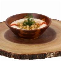 Hummus · Vegetarian. Ground chick peas with tahini sauce, citric acid, salt and olive oil.