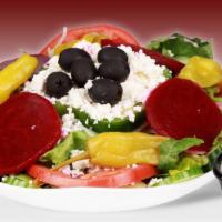 Greek Salad · Vegetarian. Fresh romaine and iceberg lettuce, tomatoes, cucumbers, feta cheese, olives, bee...