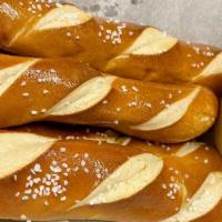 Bavarian Pretzel Stix · Five baked spears served with alfredo and honey mustard sauces.