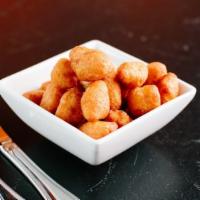 Cheese Curds · White Cheddar Cheese Curds. Deep Fried and Served with Creamy Ranch.
