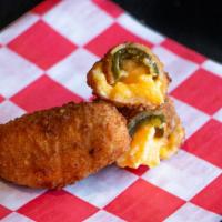 Jalapeño Poppers · Served with Creamy Ranch Dip. 5 per order
.