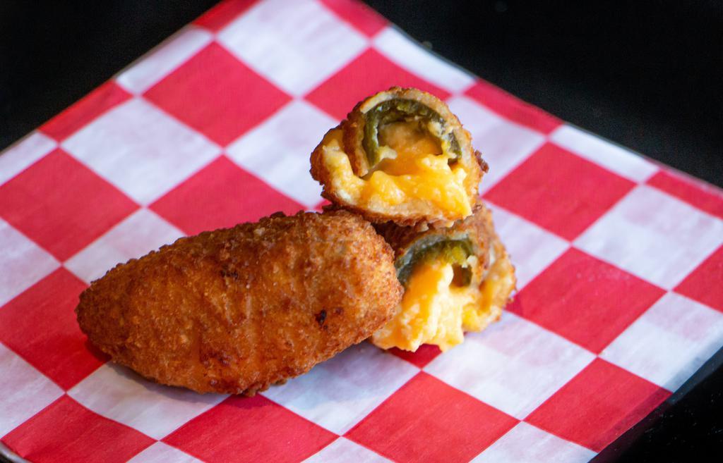 Jalapeño Poppers · Served with Creamy Ranch Dip. 5 per order
.