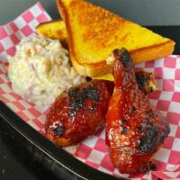 Cookout · 2 Roasted Chicken Legs slathered with BBQ sauce and glazed to perfection. Served with Texas ...