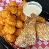 Hidden Valley · 2 Roasted Chicken Legs tossed with Zesty Ranch Spice Rub. Served over crispy Tater Tots with...