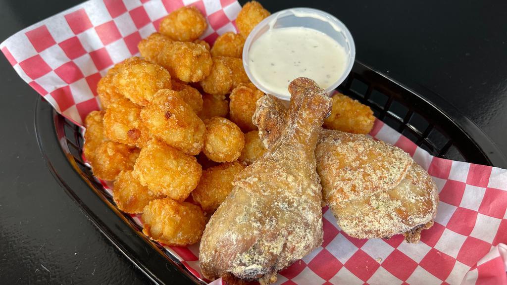 Hidden Valley · 2 Roasted Chicken Legs tossed with Zesty Ranch Spice Rub. Served over crispy Tater Tots with more creamy ranch dipping sauce on the side.