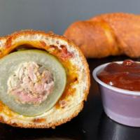Porky Dill Dough · Cored Dill Pickle stuffed with Hickory Smoked Pork, rolled in a Cheddar and Bacon Infused Do...
