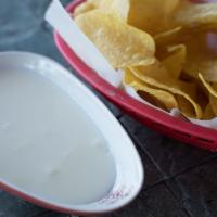Queso Dip · Salsas' own signature cheese dip. Add chorizo for an additional charge.