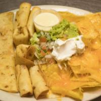 Appetizer Sampler · Variety platter including beef or chicken taquitos, a quesadilla, a chimichanga, and cheese ...