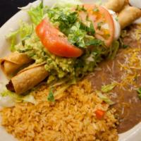 Flautas Dinner · Two corn tortillas filled with shredded beef or chicken, rolled, then deep-fried to a golden...