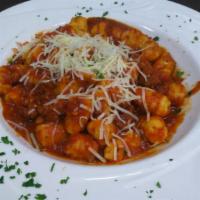 Gnocchi With Meat Balls · Homemade meatballs with homemade bolognese meat Sauce over ricotta gnocchi and topped shredd...