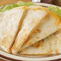 Cheese Quesadilla · Warm tortilla filled with grilled green peppers, onions, and Cheddar cheese. Served with sou...