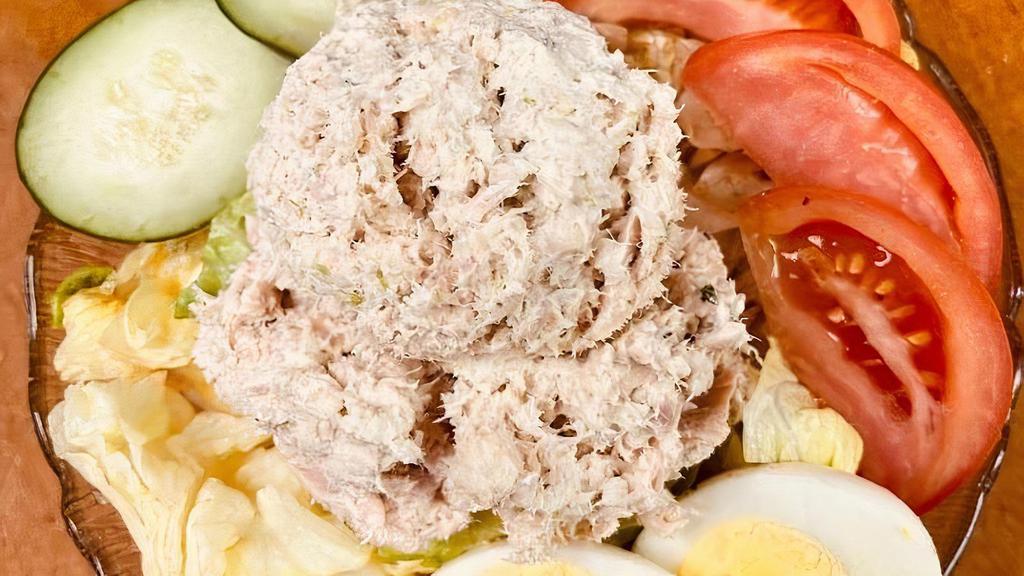 Tuna Salad · Crisp lettuce, white tuna, cucumber, tomato and egg.